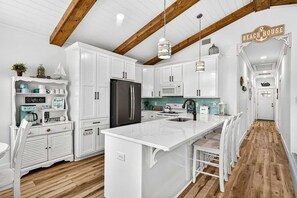 Stovetop, dishwasher, dining tables