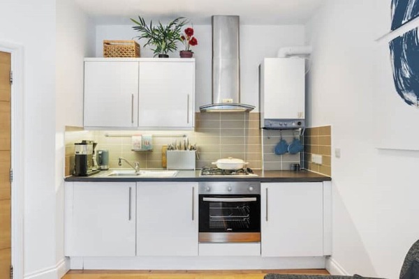 Microwave, oven, cookware/dishes/utensils, dining tables