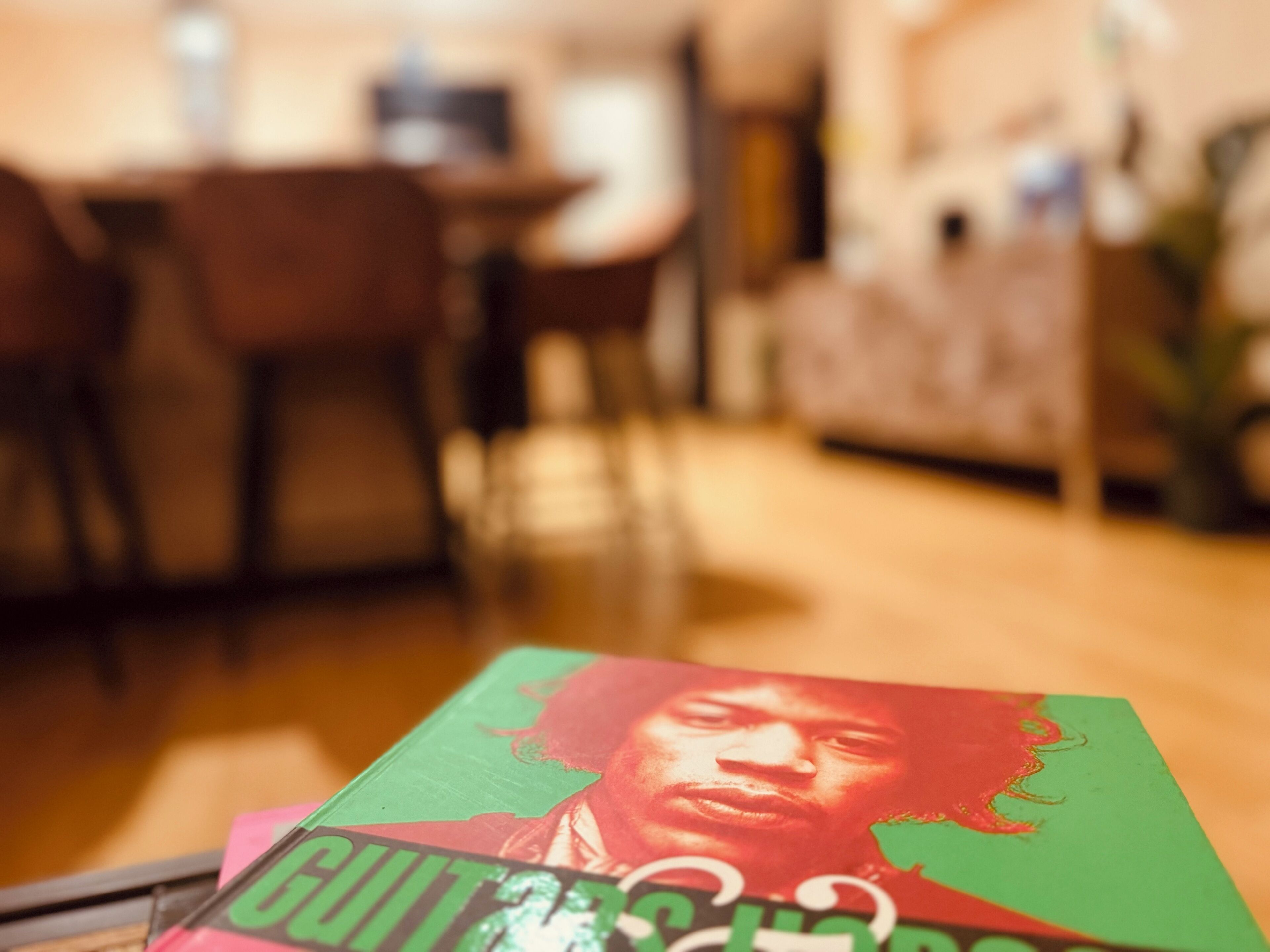 A close-up of a magazine or book cover with a person's portrait and the word "BUTT" visible.