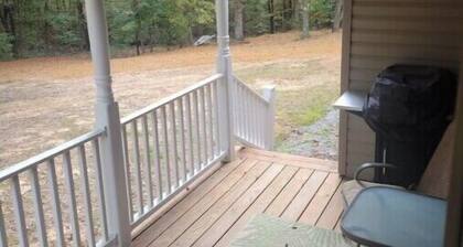 Lake cabin with attached pull thru garage