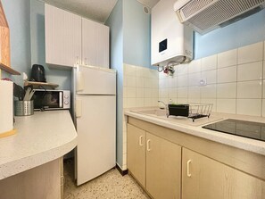 Fridge, microwave, cookware/dishes/utensils