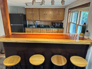 Fridge, microwave, coffee/tea maker, cookware/dishes/utensils - 2-bedroom lower level walkout apartment , moments from downtown Bryson (Bryson City)