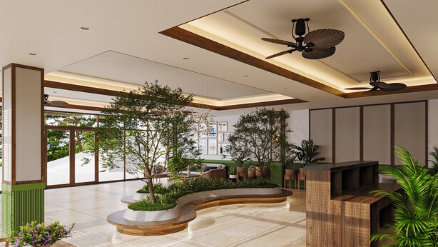 Un vestíbulo moderno con un mostrador de recepción curvo, ventanas amplias y ventiladores de techo.