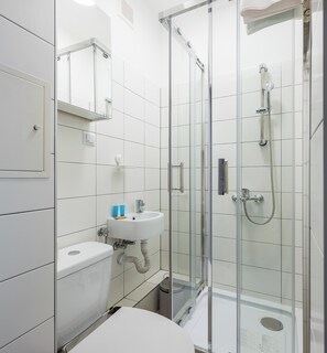 Shower, free toiletries, hair dryer, towels