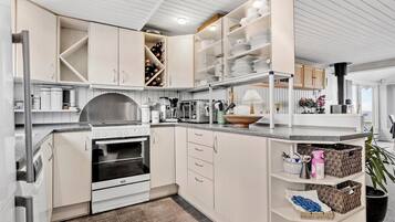 Coffee/tea maker, fridge, stovetop, dishwasher