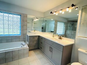 Jetted tub, hair dryer, towels, soap