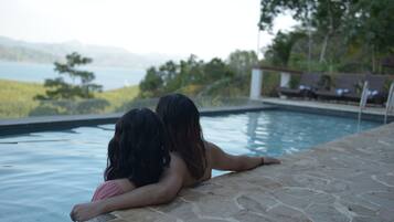 Outdoor pool, open 7:00 AM to 7:00 PM, sun loungers