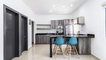 Fridge, microwave, stovetop, coffee/tea maker