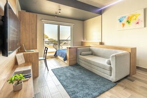 Apartamento de lujo, 1 cama doble con sofá cama, no fumadores, patio | Zona de estar