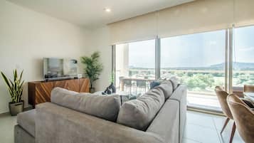 Luxury Apartment, 3 Bedrooms, Non Smoking, Executive Level | Living area | Flat-screen TV