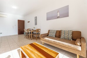 Comfort Apartment, City View | Living area | Flat-screen TV - Sunlit Cozy Apartment (Larnaca)