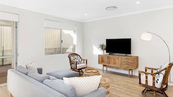 Deluxe House, Multiple Beds, Non Smoking | Living area | 65-inch Smart TV with digital channels, Netflix, streaming services