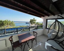 Deluxe Suite, Balcony, Sea View | In-room safe, blackout drapes, free WiFi