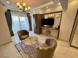 Deluxe Room, Balcony, City View | In-room safe, blackout drapes, free WiFi