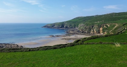 The Anchorage is a spacious 4-bedroom holiday cottage in Church Bay