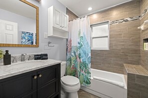 Shower, hair dryer, towels