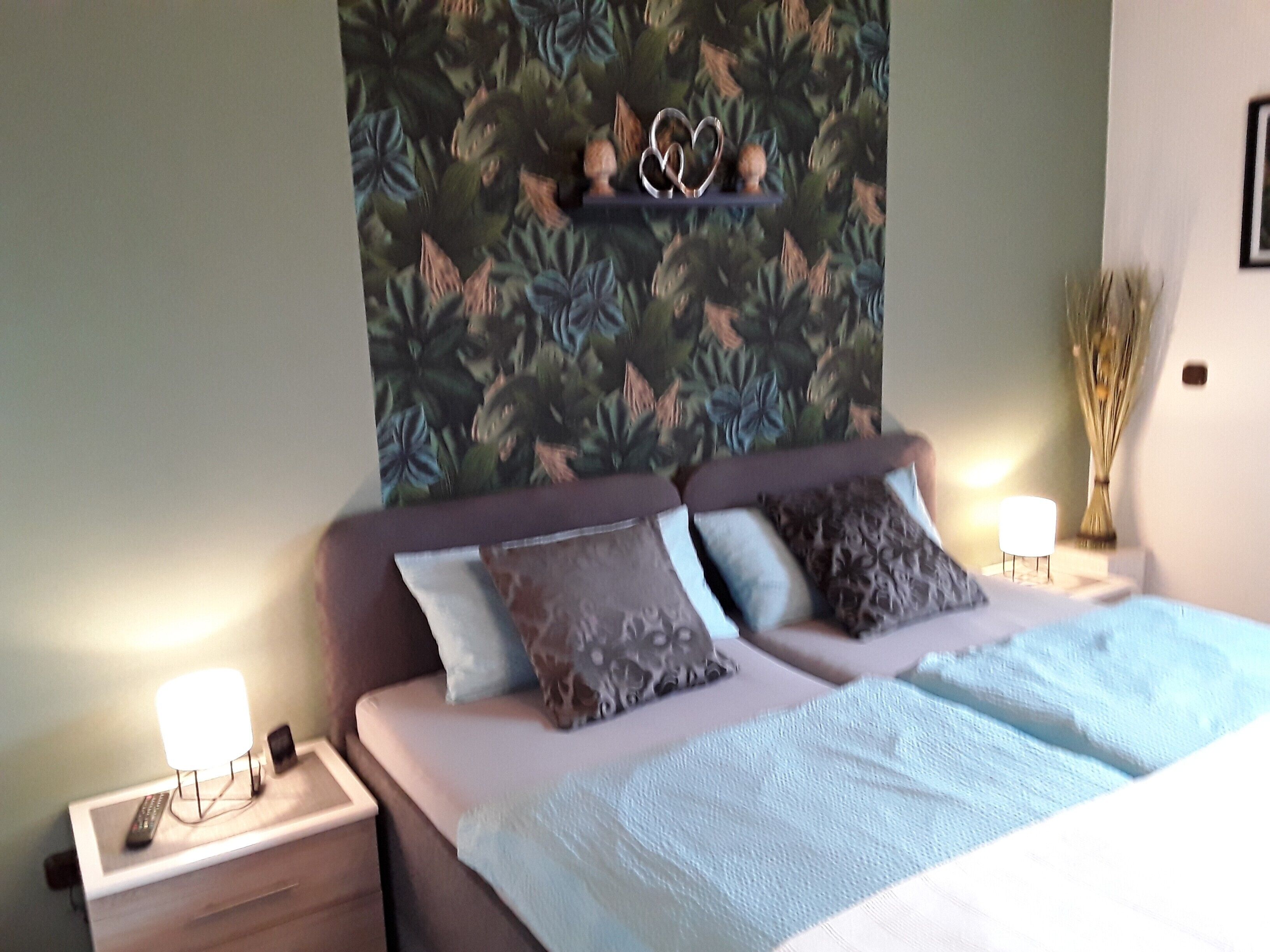 1 dormitorio, tabla de planchar con plancha, wifi gratis y ropa de cama