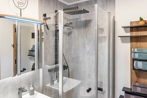 Shower, free toiletries, hair dryer, towels