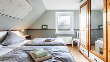 2 slaapkamers, een strijkplank/strijkijzer, gratis wifi, beddengoed