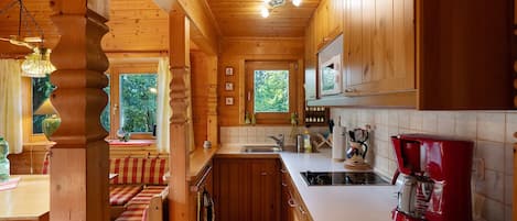 Fridge, microwave, stovetop, coffee/tea maker