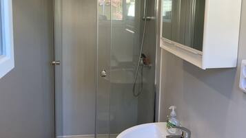 Shower, towels, soap, shampoo