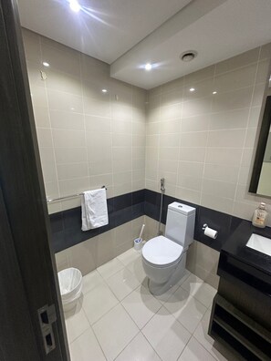 Shower, bidet, towels, soap