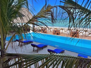 Outdoor pool, pool umbrellas, sun loungers