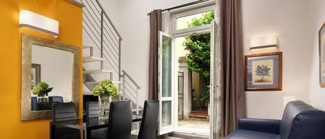 Junior Suite, Garden View | Down duvets, in-room safe, individually decorated, desk