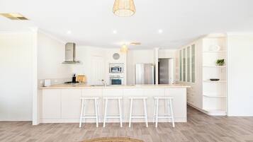 Design House, 4 Bedrooms, Non Smoking | Private kitchen | Full-sized fridge, microwave, oven, dishwasher