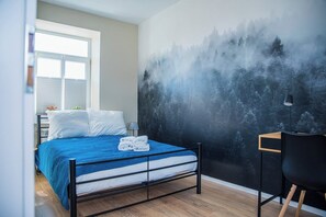 1 غرفة نوم ومكواة/لوح كي وواي فاي مجانًا وملاءات أسرّة