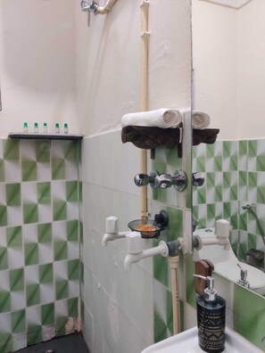 Shower, towels, soap, shampoo