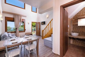 Appartement Deluxe, coin cuisine, vue partielle sur la mer | Cuisine privée