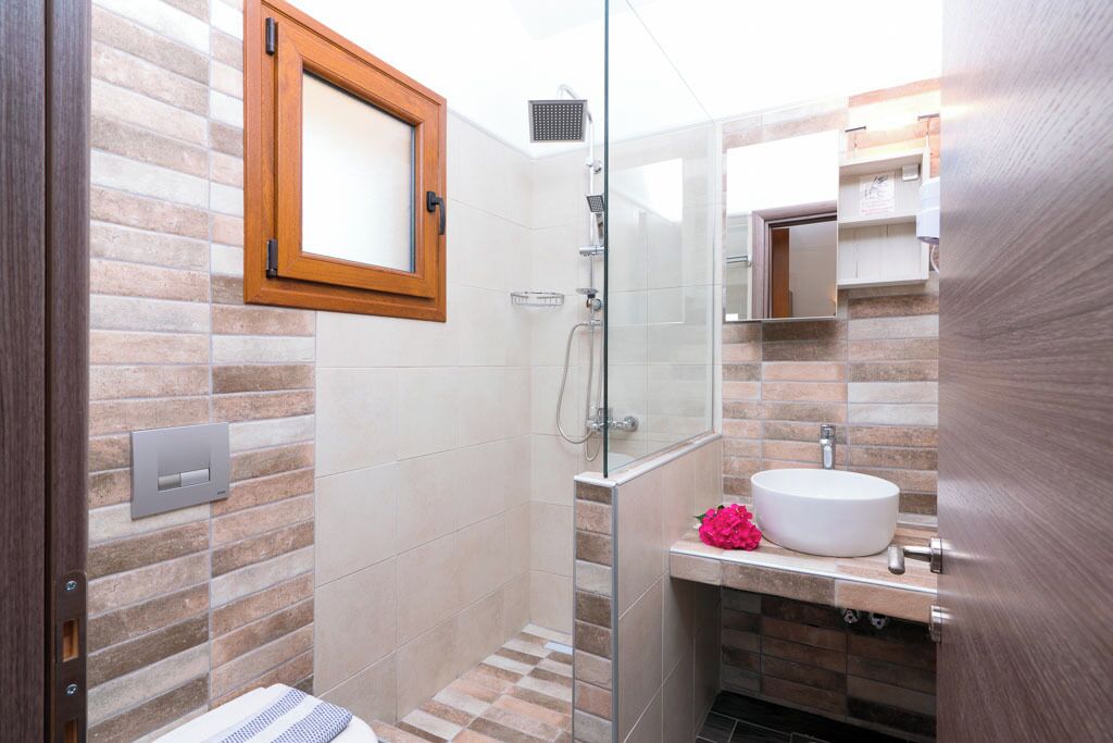 Family Room, Sea View | Bathroom | Hair dryer, towels, soap, shampoo