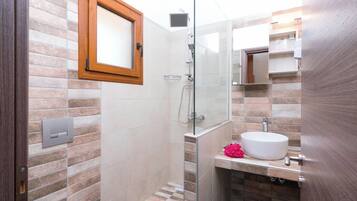 Family Room, Sea View | Bathroom | Hair dryer, towels, soap, shampoo