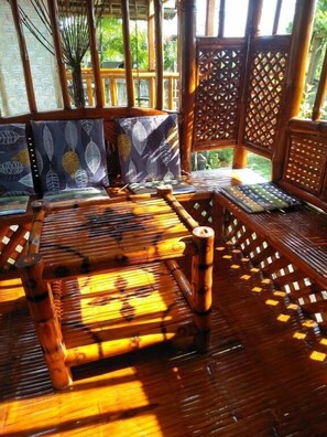 Traditional Room, 1 Bedroom, Garden View | Terrace/patio - Titanic's Nipa Huts by Hiverooms (Moalboal)