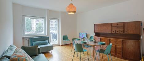 Family Apartment, Multiple Bedrooms (Comfort Tra Fiume E Pini) | Living area | 32-inch Smart TV with cable channels