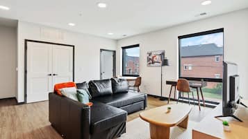 Deluxe Apartment | Living area | 42-inch Smart TV with digital channels