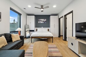 Deluxe Studio | Living area - CozySuites at Block20 (Indianapolis)