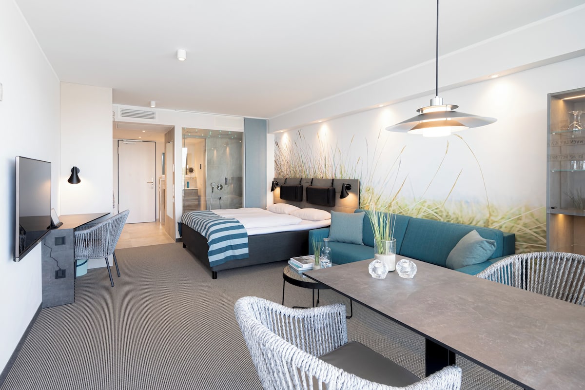 Superior tweepersoonskamer, balkon, uitzicht op tuin | Luxe beddengoed, donsdekens, een minibar, een kluis op de kamer