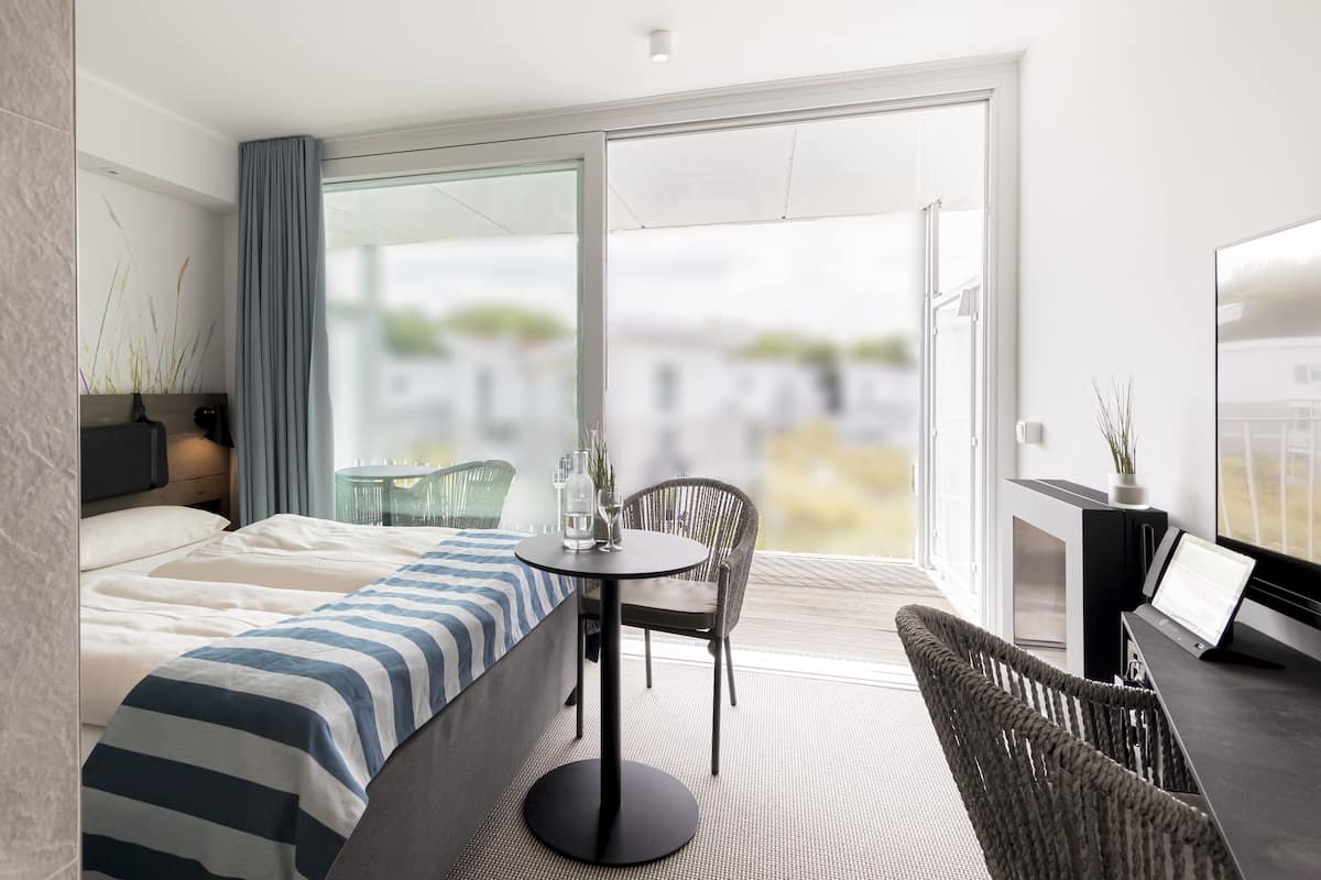 Comfort tweepersoonskamer, balkon, uitzicht op tuin | Luxe beddengoed, donsdekens, een minibar, een kluis op de kamer