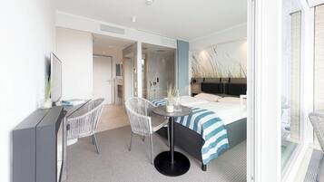 Premium bedding, down duvets, minibar, in-room safe