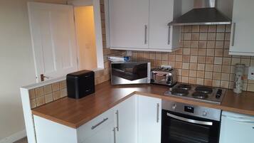 Apartment | Private kitchen | Fridge, microwave, oven, stovetop