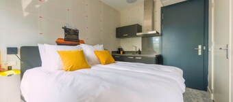 Unique apartment with private kitchen and bathroom, inspired by the abstract art of Lena Milius.