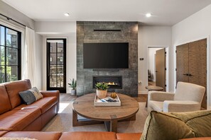 TV, fireplace - Contemporary Condo| Fireplace and Balcony (Tamarack)