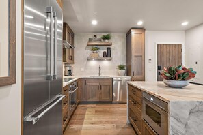 Fridge, microwave, oven, stovetop - Contemporary Condo| Fireplace and Balcony (Tamarack)