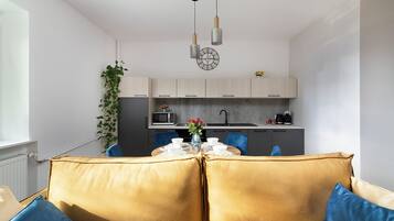 Comfort Apartment | Living area | Flat-screen TV