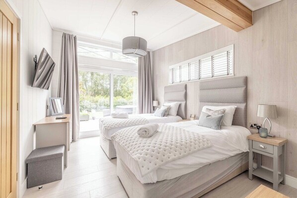 2 dormitorios, tabla de planchar con plancha, cuna de viaje y wifi