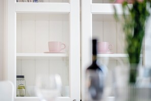 Apartamento conforto, vista para a cidade | Área de estar | TV de tela plana