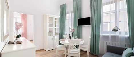 Comfort Apartment, City View | Living area | Flat-screen TV