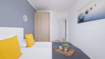 2 habitaciones, tabla de planchar con plancha, wifi y ropa de cama
